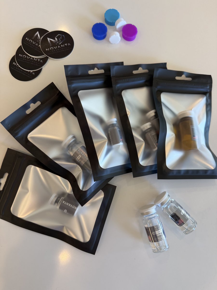 Novanta Research vials sealed in protective pouches with branded stickers